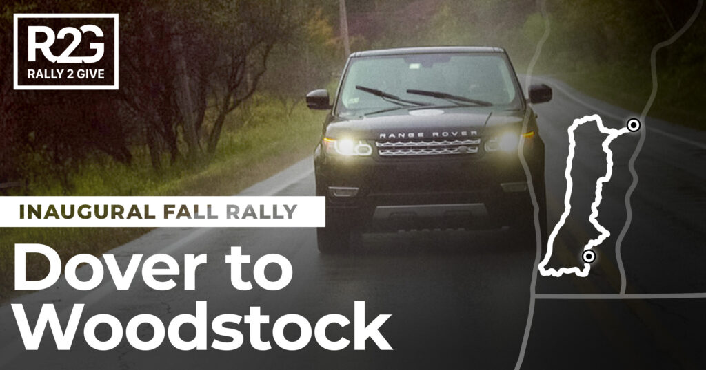 Rally 2 Give 2017 Inaugural Fall Rally hero image, a black Range Rover driving through rain on the Dover to Woodstock route.