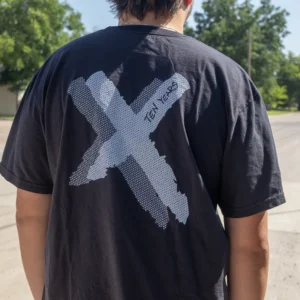 model wearing Rally 2 Give 10 year X t shirt